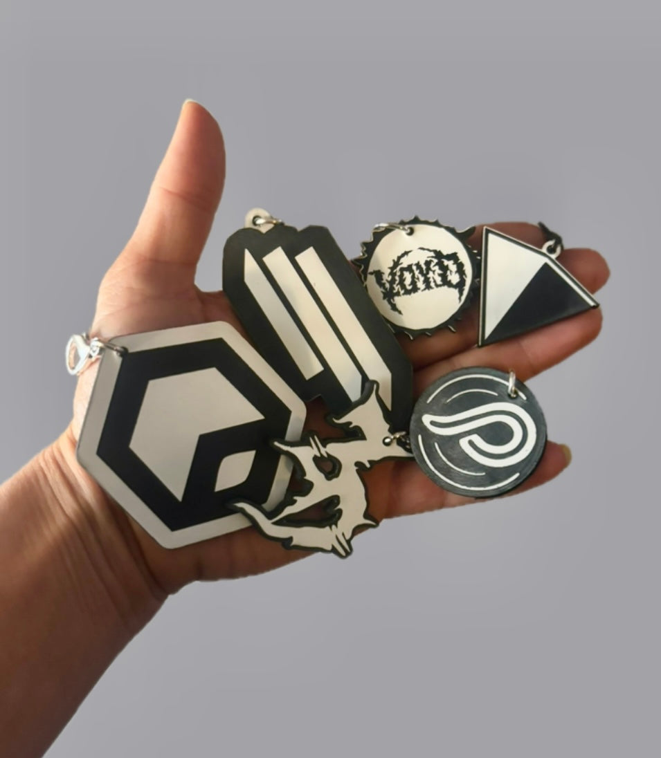 Custom black & white acrylic clip on charms