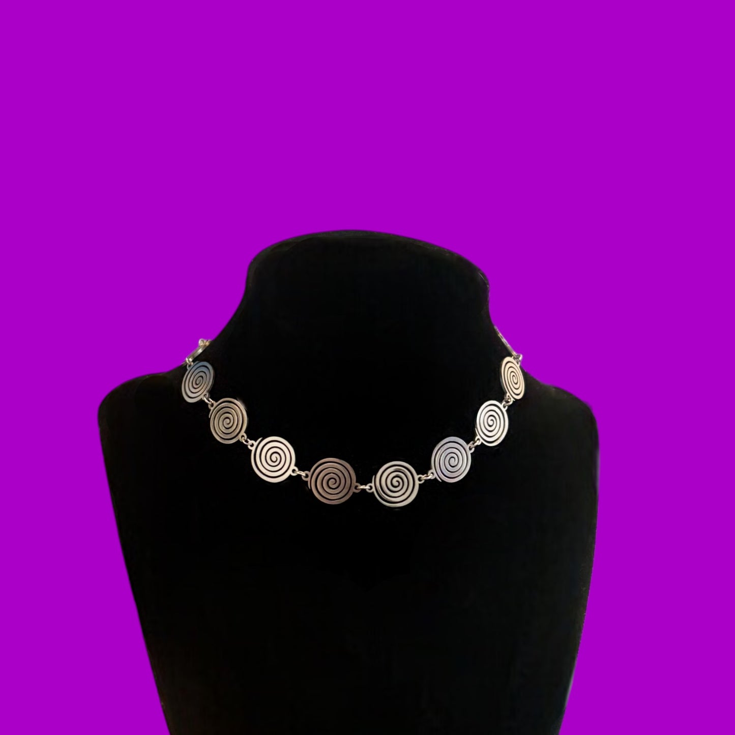 Stainless steel swirl choker