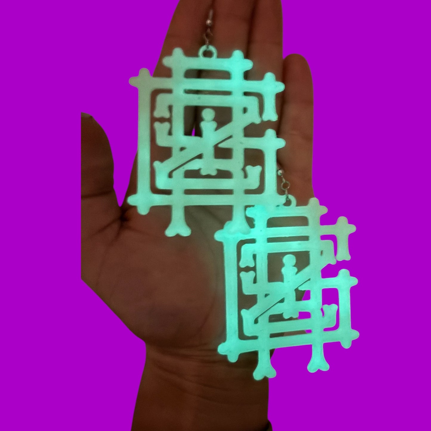 Large 3d printed Griz bones glow in the dark earrings