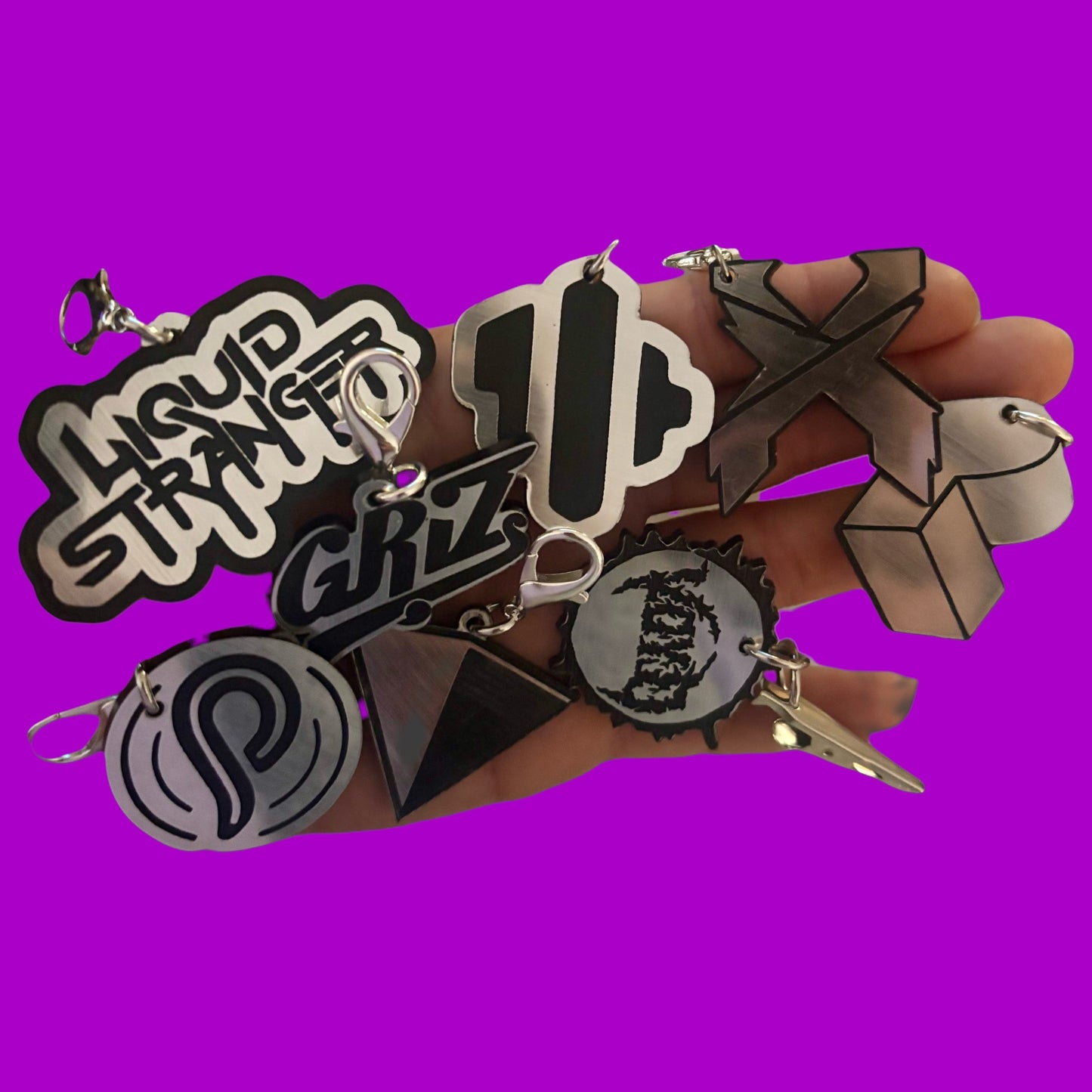 Custom steel and black acrylic clip on charms