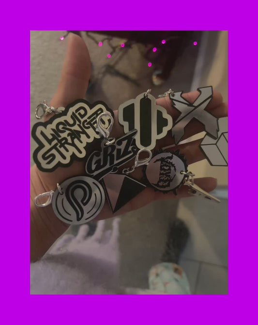 Custom steel and black acrylic clip on charms